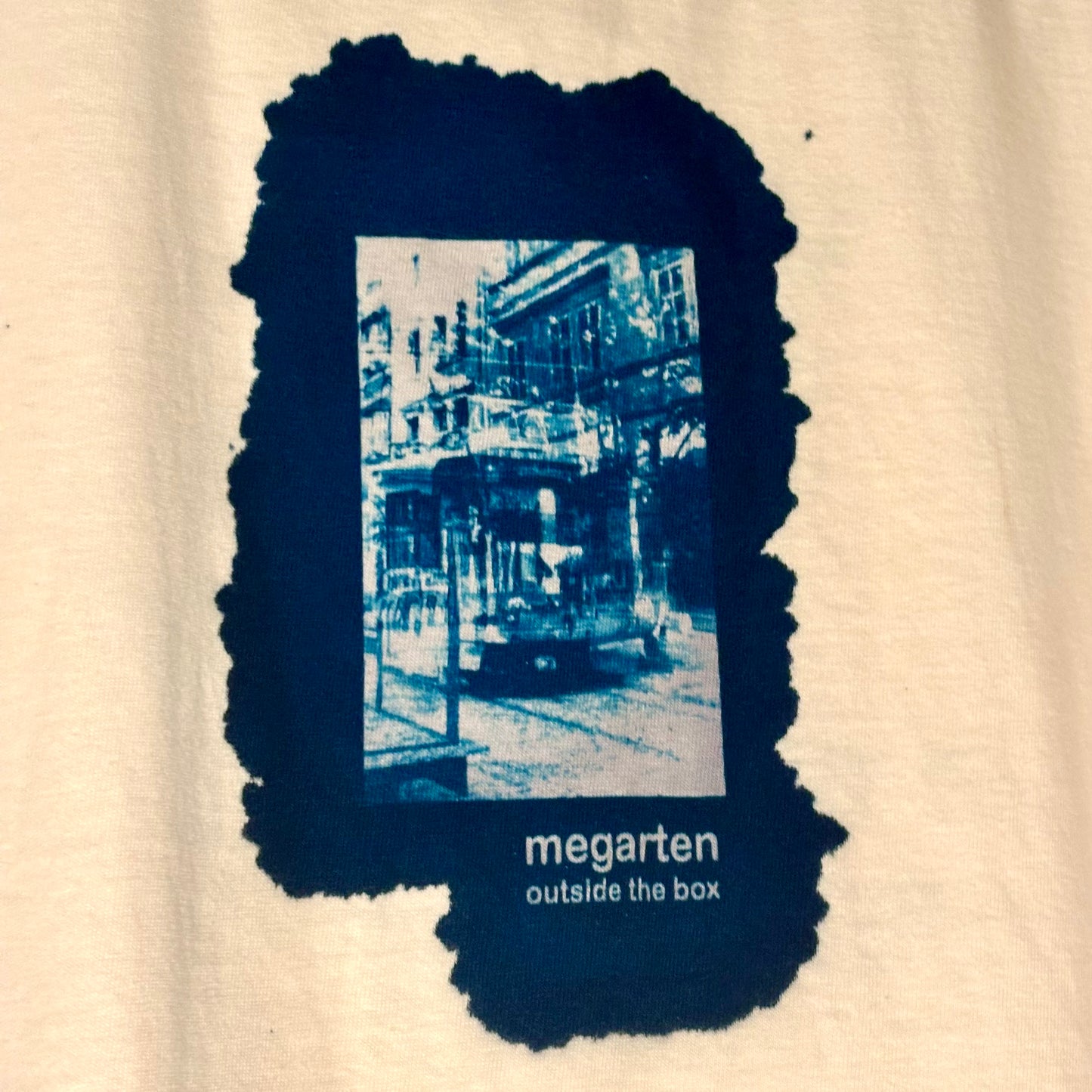 Wearable Art Cyanotype Tee – "Bike Jesus Graffiti and a Plzeň Tram, Dual Exposed"