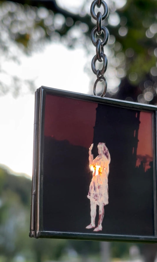 Decorative Hanging Stained-Glass Photograph – Square, Thick Chain, “Holding Up the Leaning Tower with a Painted Negative”