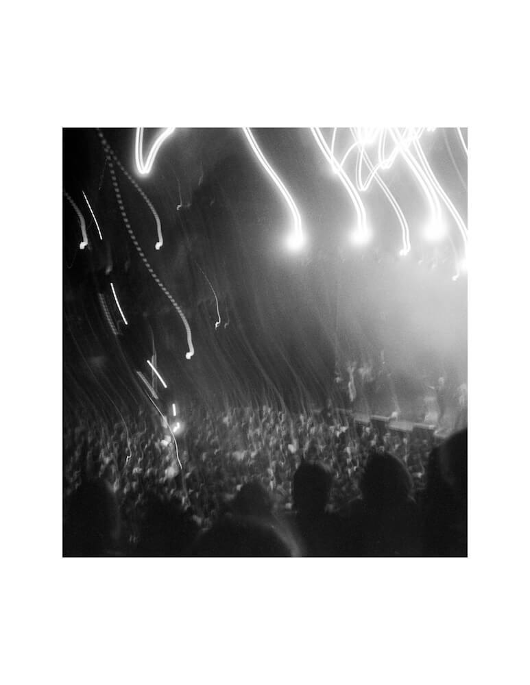 long exposure black and white fine art film photograph with light trails at a concert